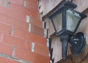A tilting chimney in Macclenny showing serious foundation damage.