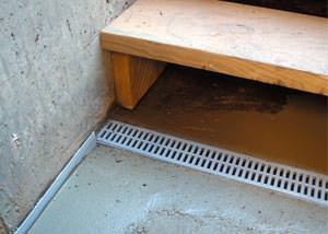a hatchway entrance in Folkston that has been protected from flooding by our TrenchDrain basement drainage system.