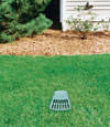 A buried gutter drain downspout extension installed in a Keystone Heights home